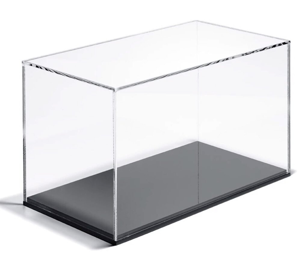 Factory technician measuring acrylic display box dimensions